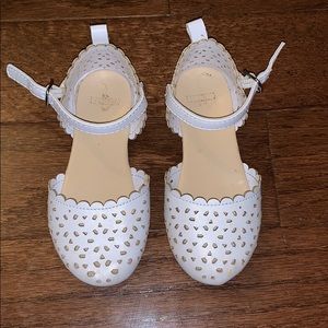 White closed toe leather shoes